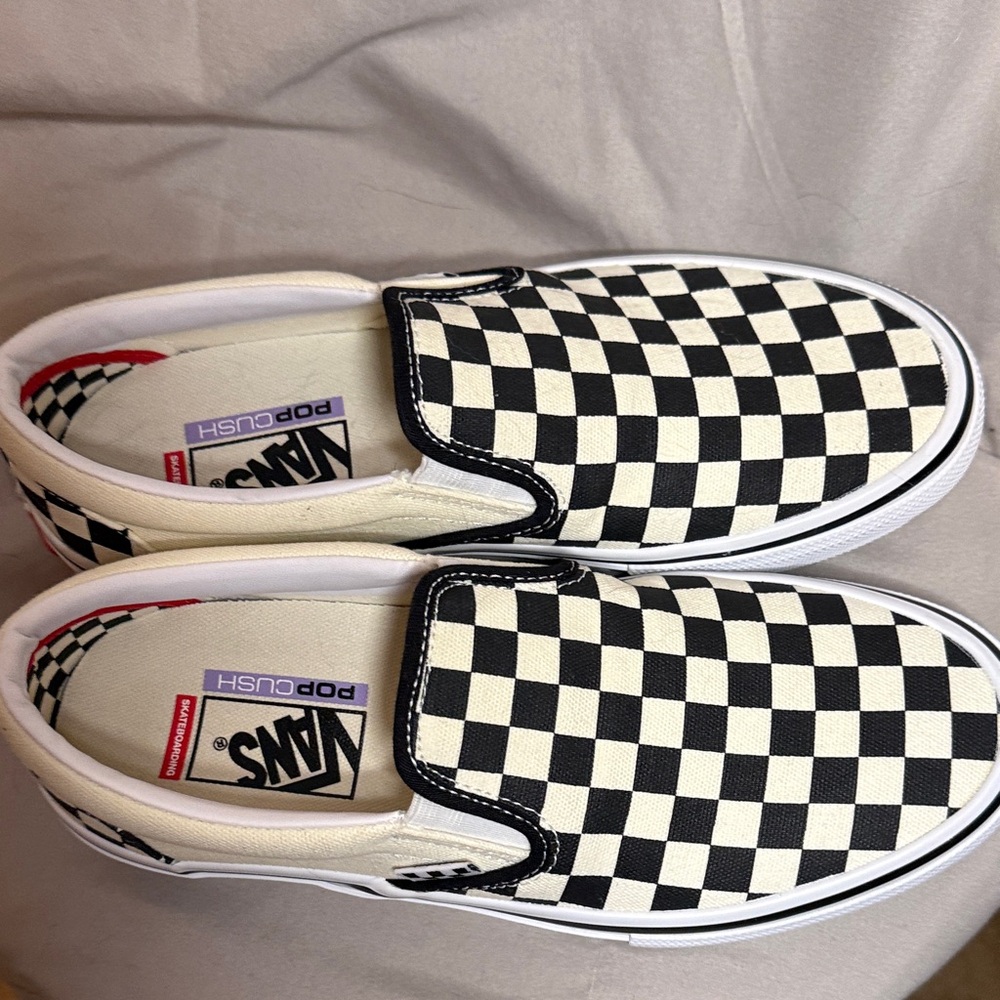 Vans Black and White Checkerboard Slip-Ons